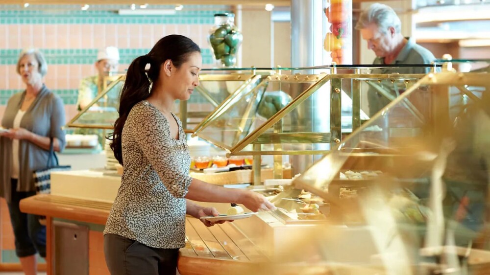 horizon court buffet ruby princess woman getting food 16x9